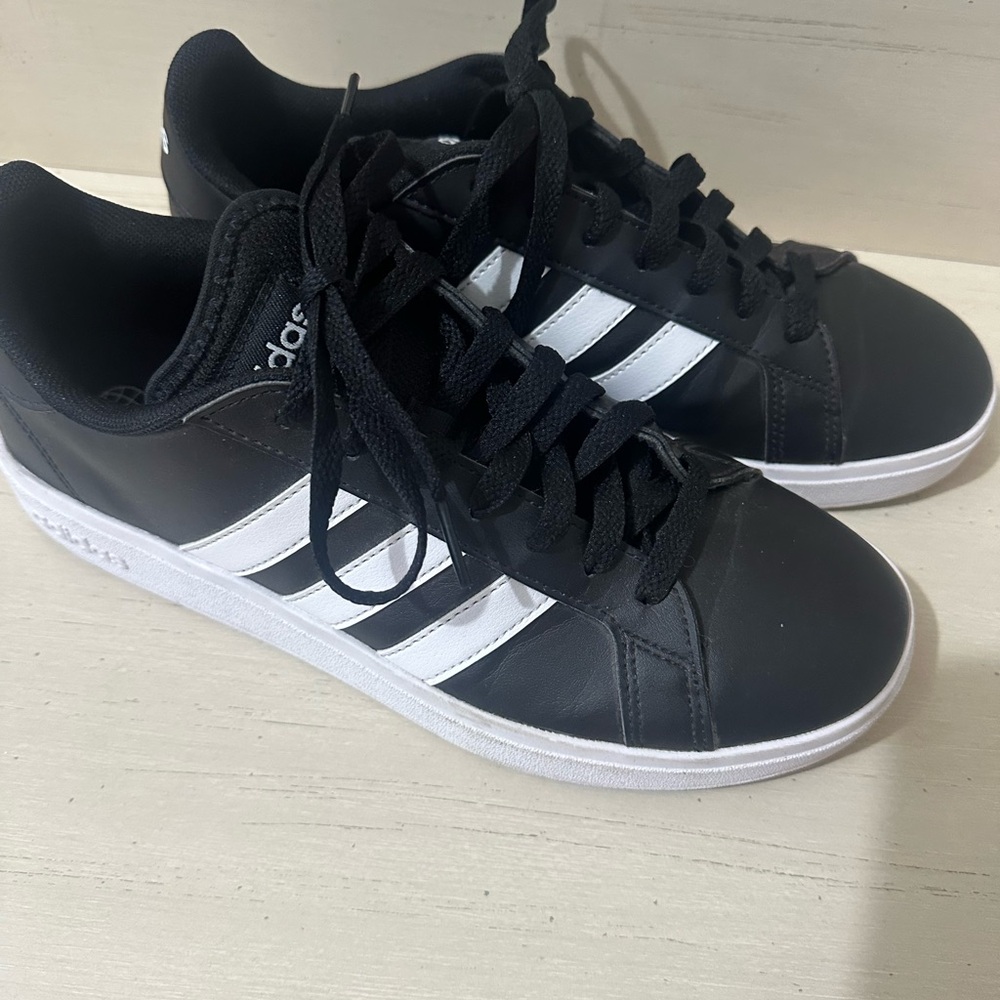 Adidas Women’s Black Sneakers with White Stripes